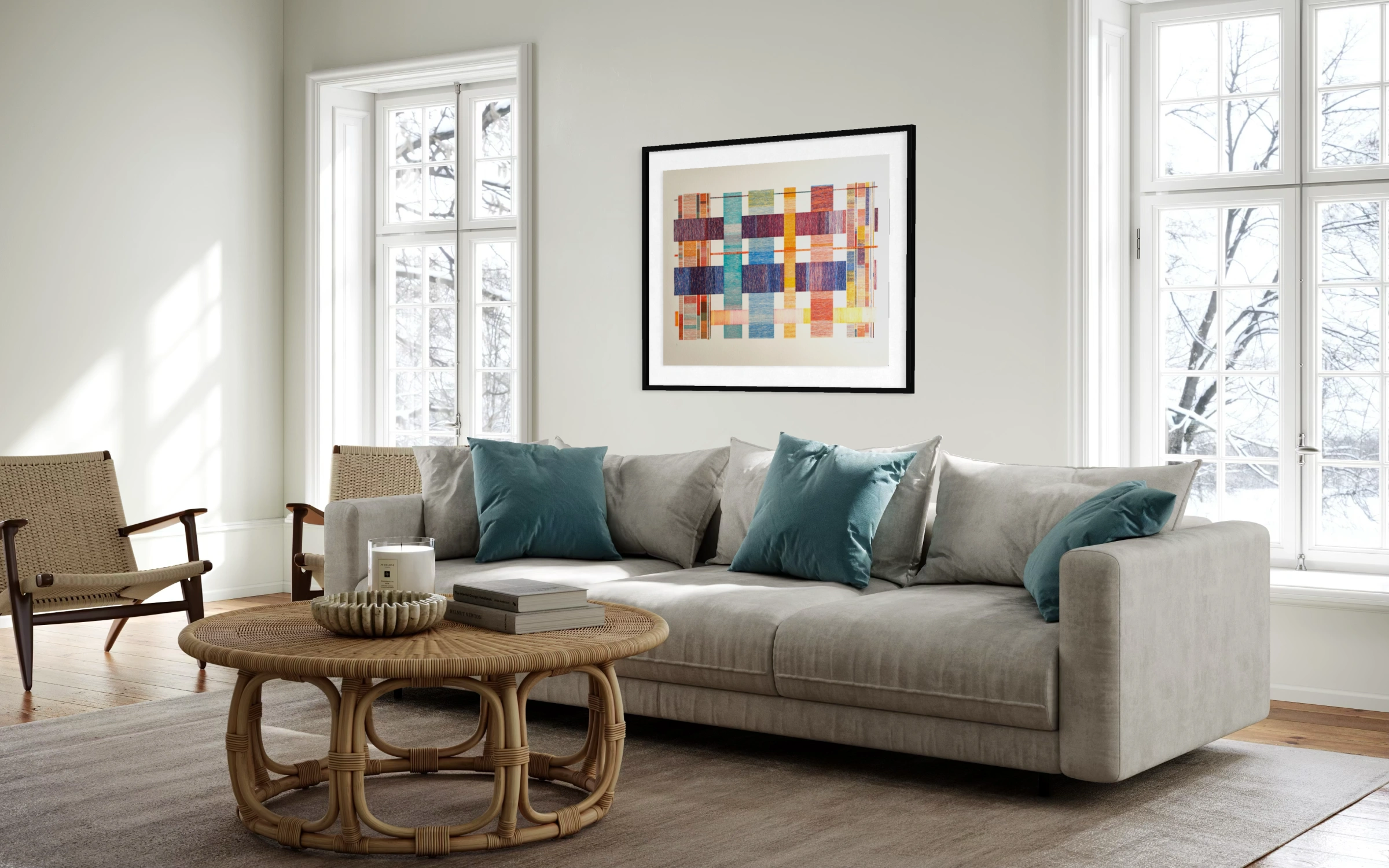 Framed prints above the living room sofa